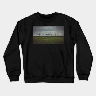 Moody sky over meadow and power lines Crewneck Sweatshirt